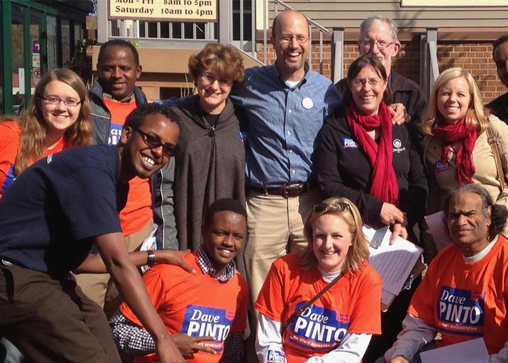 Representative Dave Pinto posing with a group of volunteer canvassers